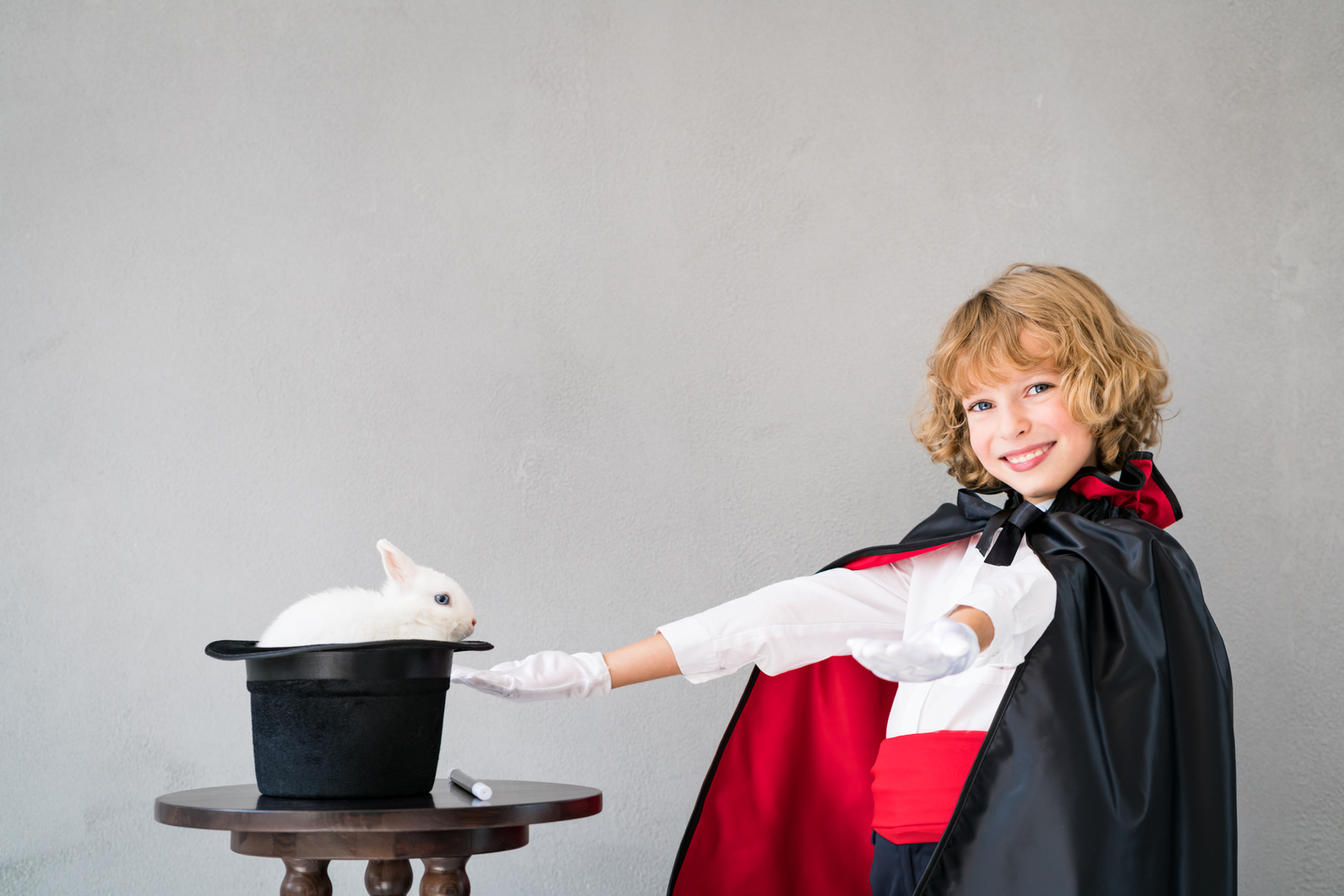 Child Magician with Cute Rabbit